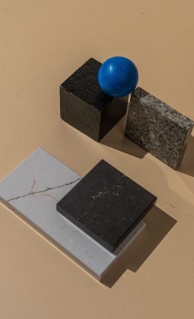 Artistic studio setup of colorful geometric shapes and textures.